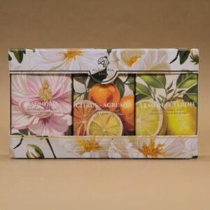 case containing three soaps wrapped with floral graphics in different scents (magnolia, citrus, lemon) produced by alchimia soap